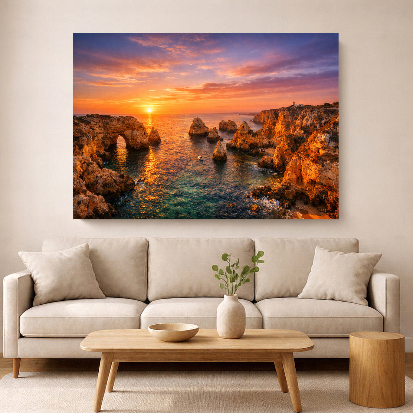 A large rectangular wall art print showing a rocky Algarve coastal sunset with turquoise water and orange sunset - Portugal Canvas Co