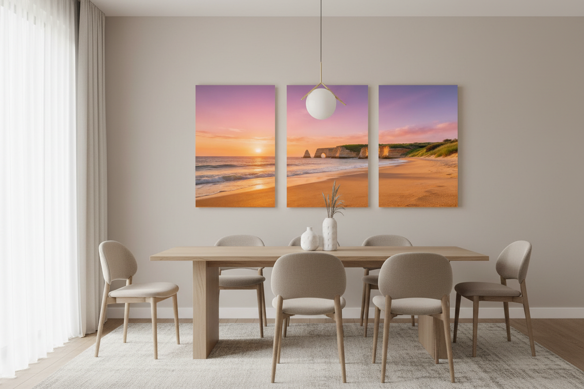 Algarve beach sunset triptych canvas wall art displayed above a dining table in a coastal dining room - Portugal Canvas Co