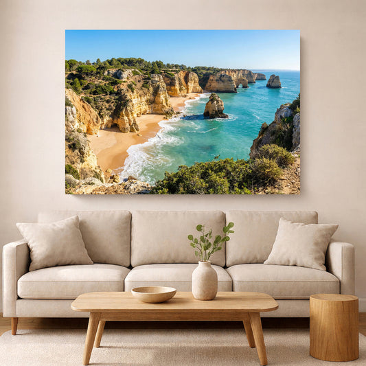 Beige sofa in a living room with a large wall art of a beach scene.