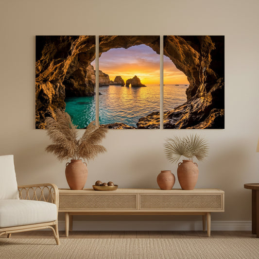 Algarve sea cave arch triptych canvas wall art – golden sunset, turquoise water and sea stacks viewed through rock arch - Portugal Canvas Co