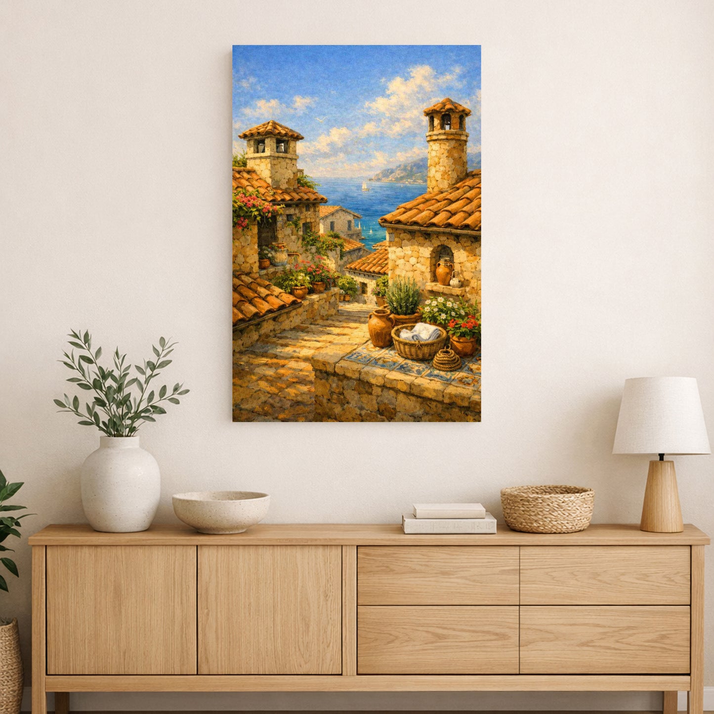 Mediterranean village with stone buildings, terracotta roofs, plants, and sea view on canvas.