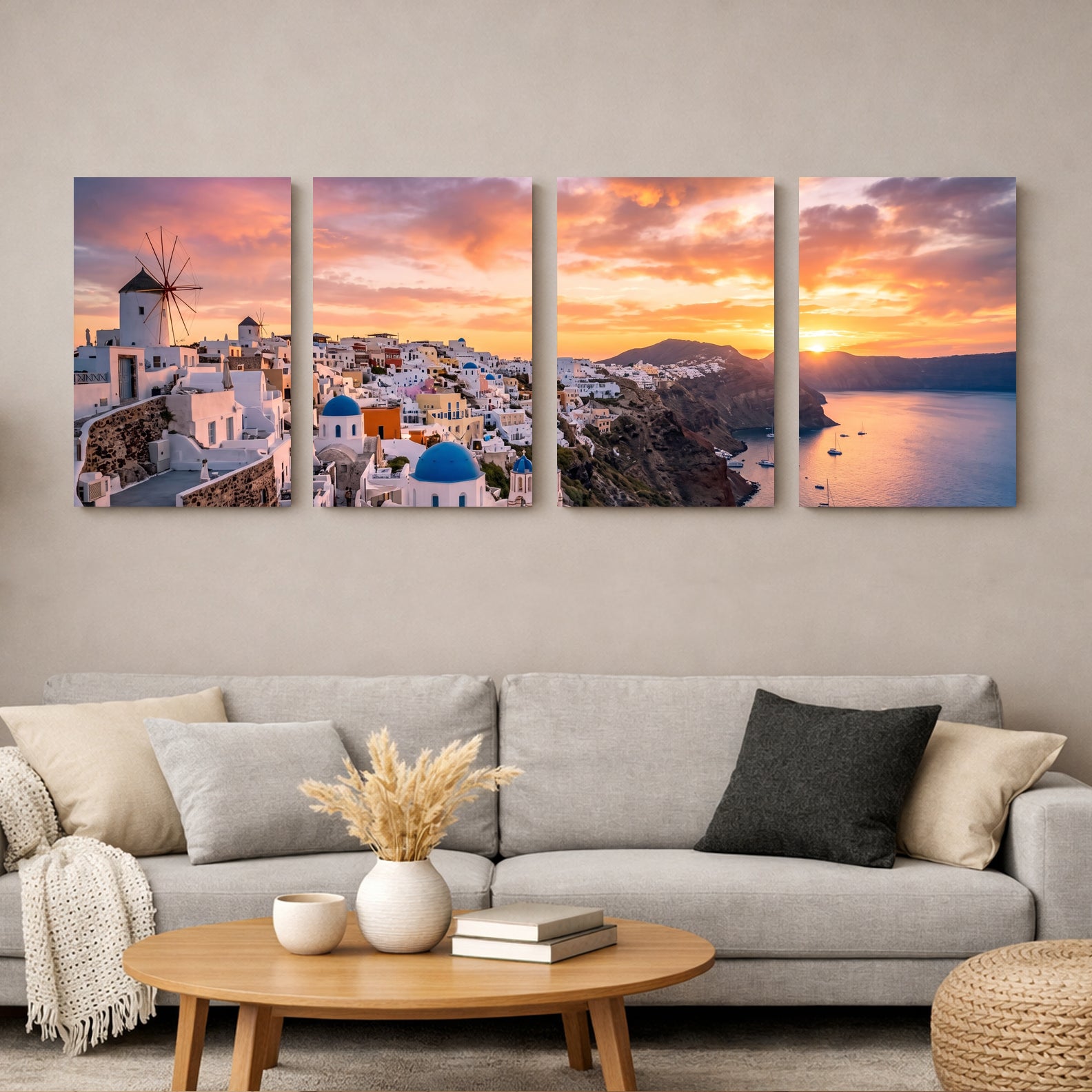 Santorini sunset four-panel canvas wall art featuring Oia whitewashed village blue-domed churches windmill and caldera at golden hour displayed above a sofa in a modern living room - Portugal Canvas Co