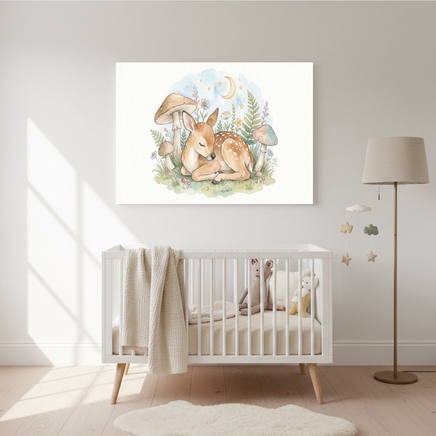 Watercolor nursery wall art of a sleeping baby fawn surrounded by mushrooms, ferns, grass, stars, and a crescent moon above a white crib in a softly lit nursery.