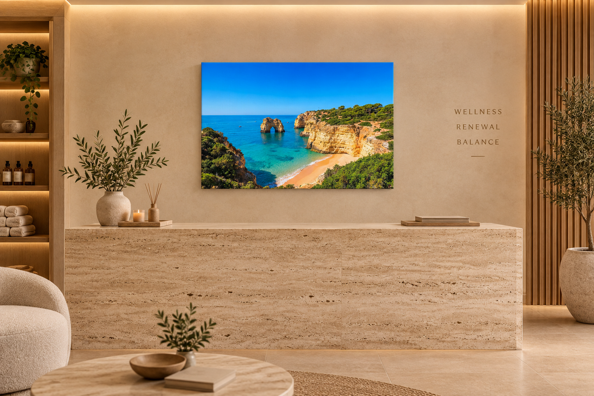 Algarve rock arch beach canvas above a travertine counter in an upscale spa reception - Portugal Canvas Co