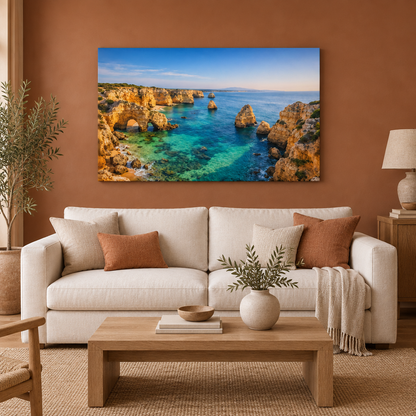 Golden coastal cliffs and turquoise sea landscape canvas wall art in a terracotta living room - Portugal Canvas Co