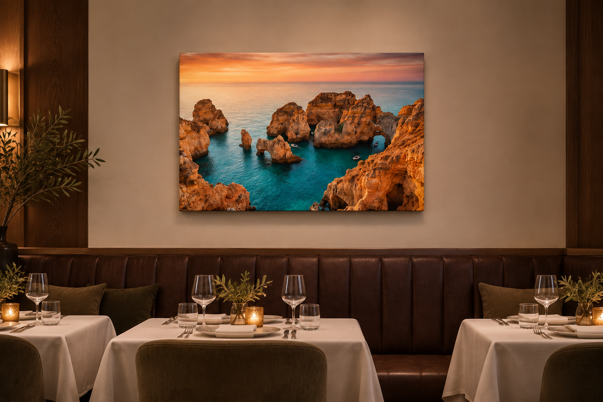 Ponta da Piedade golden rock stacks and turquoise water canvas above banquette in elegant restaurant - Portugal Canvas Co