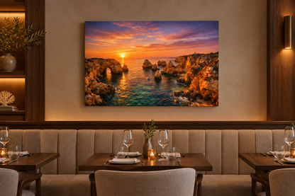 Ponta da Piedade sunset canvas above linen banquette in an elegant coastal restaurant - Portugal Canvas Co