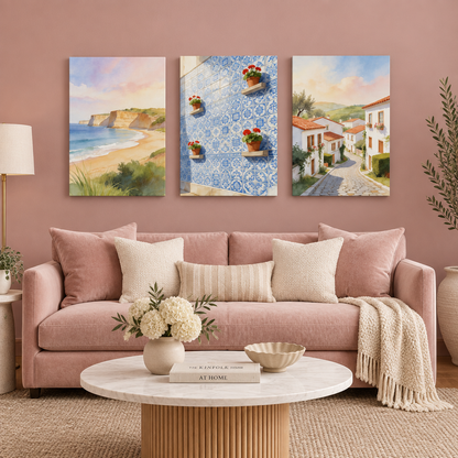 Three-piece Mediterranean canvas wall art in a blush pink living room, beach, Portuguese tiles and village street - Portugal Canvas Co