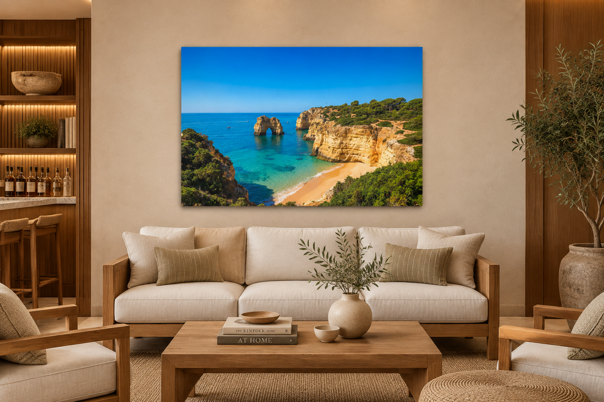 Algarve rock arch beach canvas above a linen sofa in a private club lounge - Portugal Canvas Co