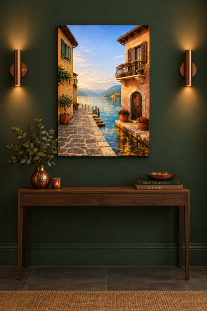 Vertical lakeside village canvas above a console on a forest green wall with copper sconces - Portugal Canvas Co