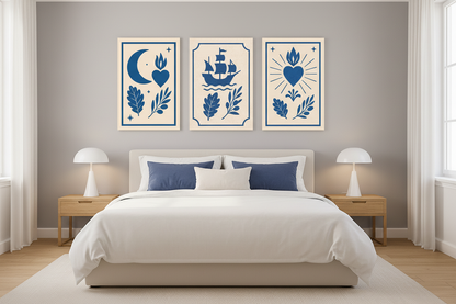 Nautical folk art moon ship and heart triptych canvas wall art set displayed in a bright airy bedroom interior - Portugal Canvas Co