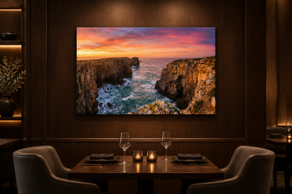 Algarve sunset cliffs canvas above a table in a dark walnut fine dining restaurant - Portugal Canvas Co