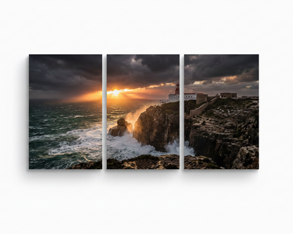 Cabo de São Vicente lighthouse triptych canvas wall art with dramatic storm clouds, golden sunset rays and crashing Atlantic waves on rugged cliffs - Portugal Canvas Co