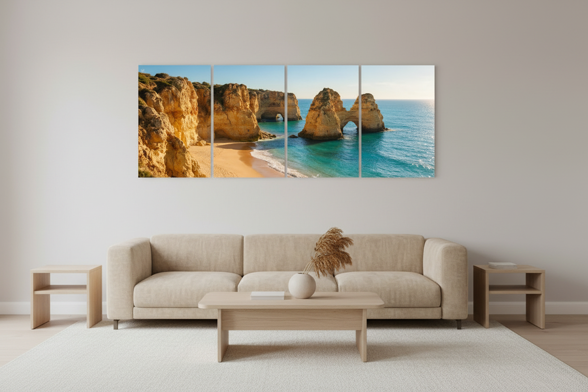 Four-panel Albufeira beach canvas wall art in a light guesthouse lounge with even indoor lighting - Portugal Canvas Co