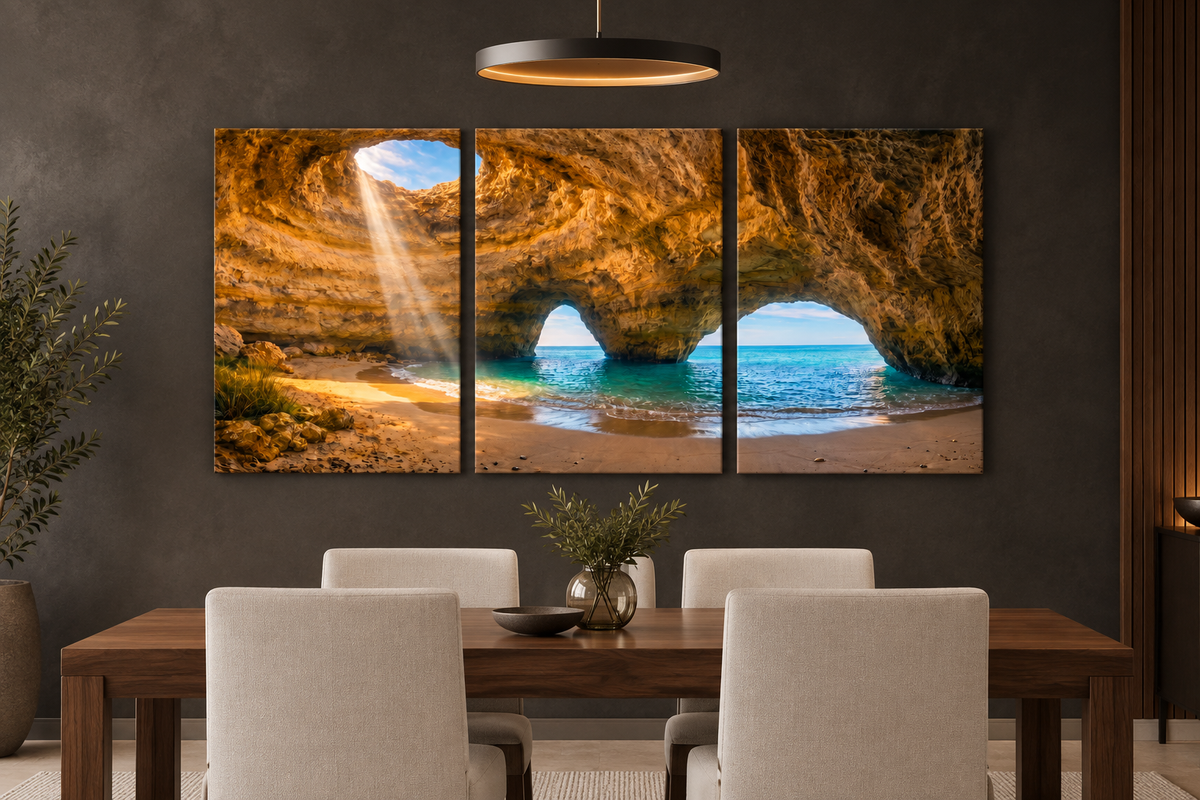 Benagil cave three-panel canvas in a charcoal dining room with walnut table - Portugal Canvas Co