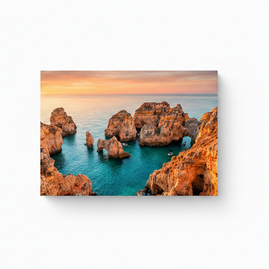 Algarve Ponta da Piedade golden rock formations sea arches turquoise cove and boats at sunset canvas wall art on white background - Portugal Canvas Co