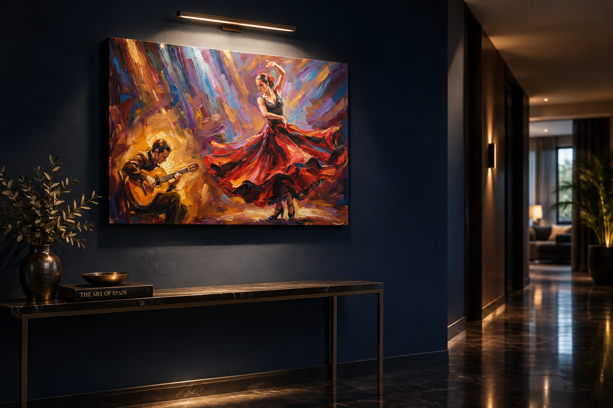 Flamenco dancer and guitarist canvas wall art lit by a picture light on a deep inky blue hallway wall above a slim console table - Portugal Canvas Co