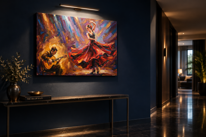 Flamenco dancer and guitarist canvas wall art lit by a picture light on a deep inky blue hallway wall above a slim console table - Portugal Canvas Co