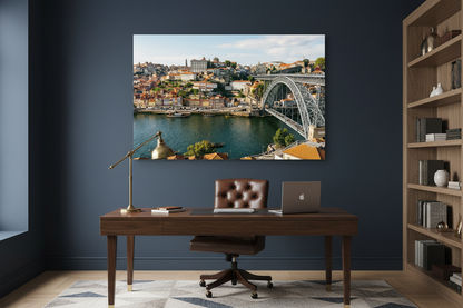 Porto Dom Luís I Bridge canvas wall art displayed in a sophisticated home office with dark navy wall and leather chair - Portugal Canvas Co