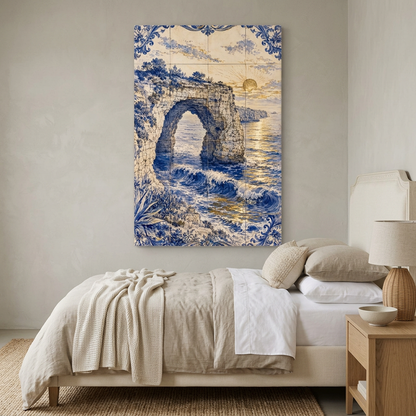 Blue and cream azulejo-style coastal rock arch sunset canvas in a neutral bedroom with cream and flax bedding - Portugal Canvas Co