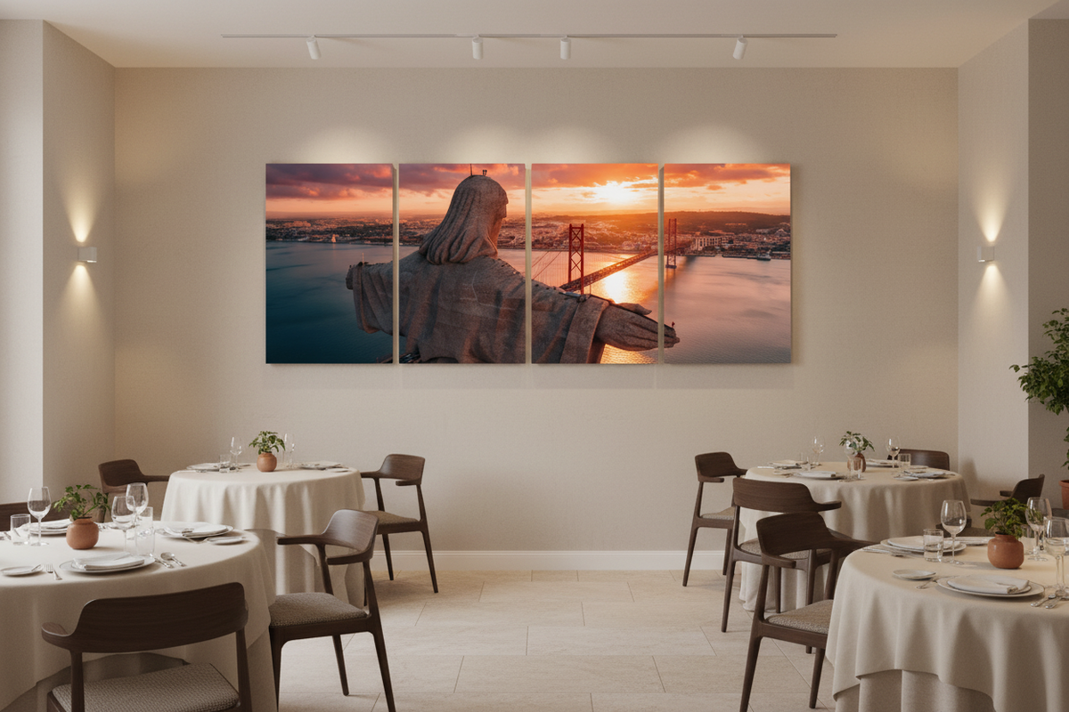 Four-panel Cristo Rei Lisbon canvas wall art in a bright windowless restaurant - Portugal Canvas Co