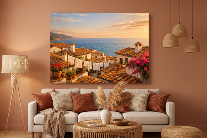 Mediterranean rooftop village at sunset canvas wall art on terracotta wall in boho living room with rattan furniture - Portugal Canvas Co