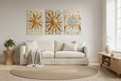 Three-panel boho Mediterranean sun mosaic triptych canvas wall art with terracotta, gold and blue tones displayed above a cream sofa in a bright Scandinavian living room with natural wood accents - Portugal Canvas Co