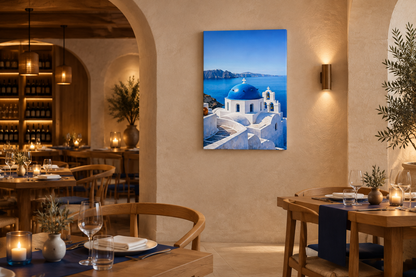 Portrait Santorini blue-dome canvas on the wall of an elegant Mediterranean fine-dining restaurant - Portugal Canvas Co