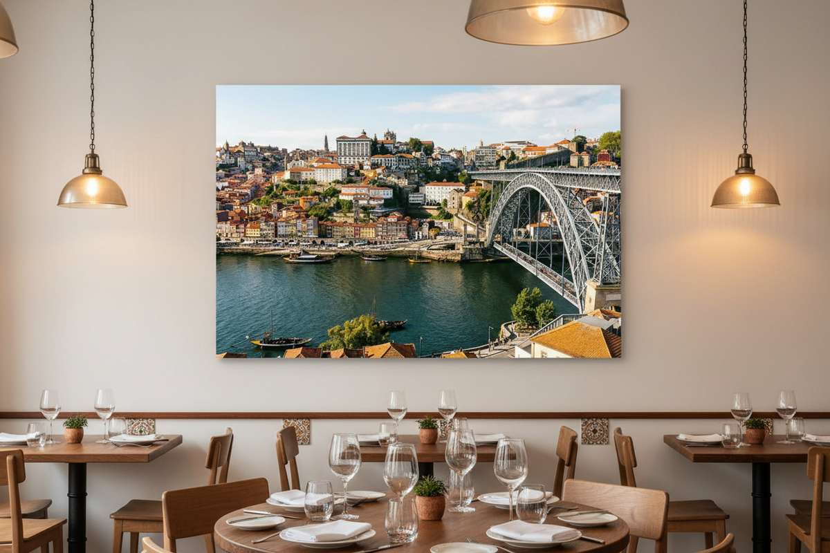 Porto Dom Luís I Bridge canvas wall art displayed in an upscale Portuguese restaurant with wooden tables and warm lighting - Portugal Canvas Co