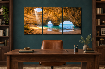 Benagil cave three-panel canvas above a walnut desk in a teal home study - Portugal Canvas Co