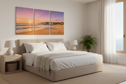 Three-panel beach canvas triptych above a boutique hotel bed - Portugal Canvas Co