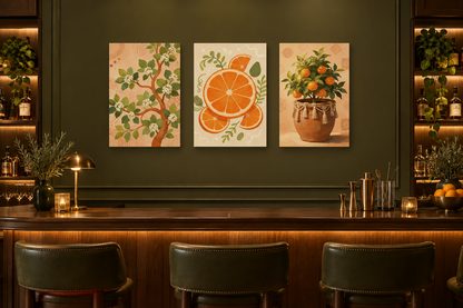 Three-piece orange citrus canvas set above a walnut counter in an olive-green cocktail bar - Portugal Canvas Co