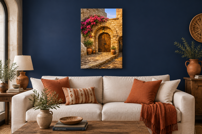 Mediterranean stone archway and bougainvillea canvas wall art above a linen sofa in a navy blue living room - Portugal Canvas Co