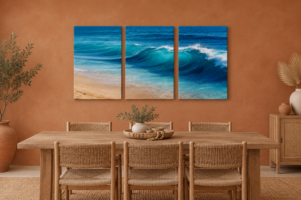 Ocean Wave triptych above a timber table in a terracotta coastal dining room with even lighting - Portugal Canvas Co