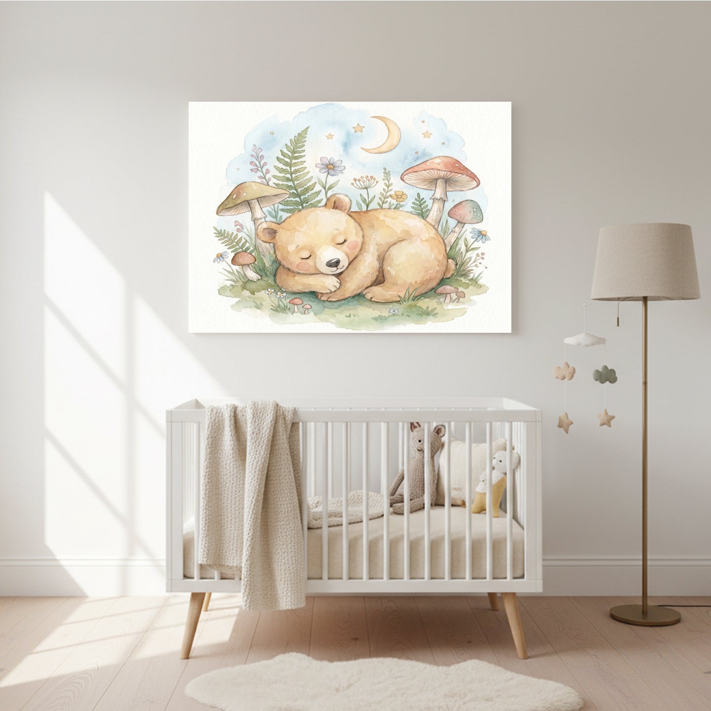 Watercolor nursery wall art of a sleeping baby bear surrounded by mushrooms, ferns, flowers, stars, and a crescent moon above a white crib in a softly lit nursery.