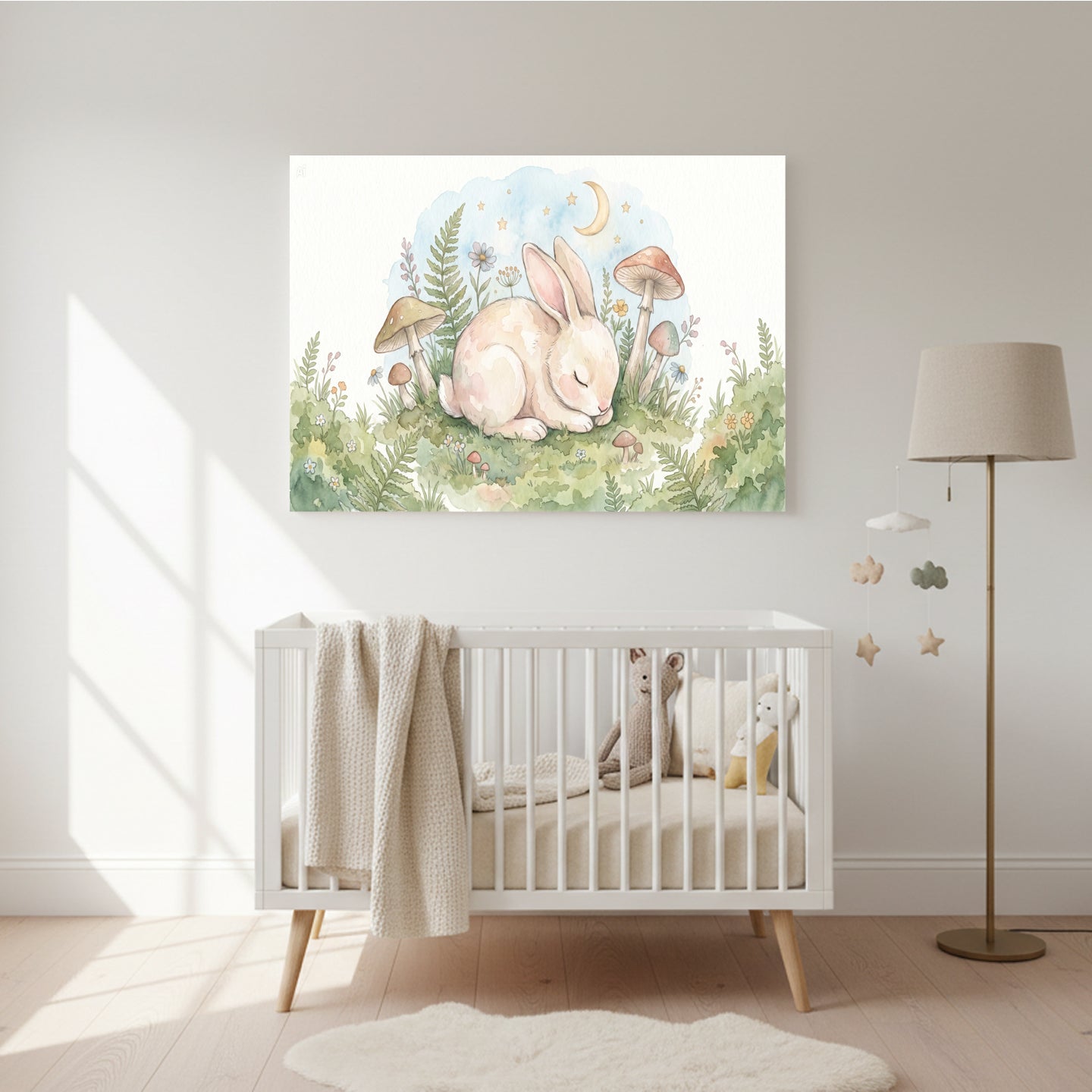 Watercolor nursery wall art of a sleeping baby rabbit surrounded by greenery, mushrooms, ferns, flowers, stars, and a crescent moon above a white crib in a softly lit nursery.