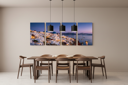 Santorini at night four-panel canvas wall art displayed above a dining table in a modern interior - Portugal Canvas Co